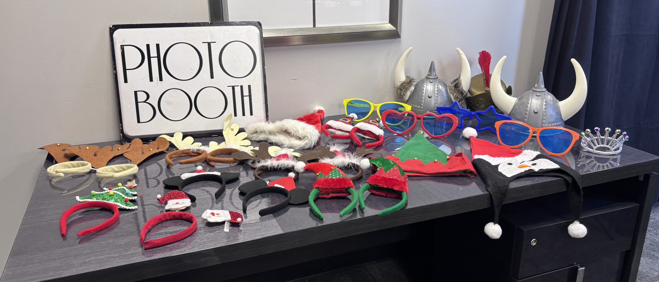 Photo Booth sign with various Photo Booth props.